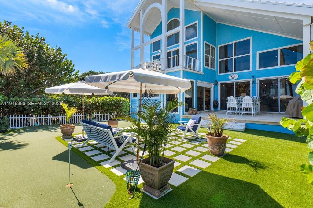 Photo of 102 Xanadu Pl, Jupiter, FL 33477 (MLS # A11946363)