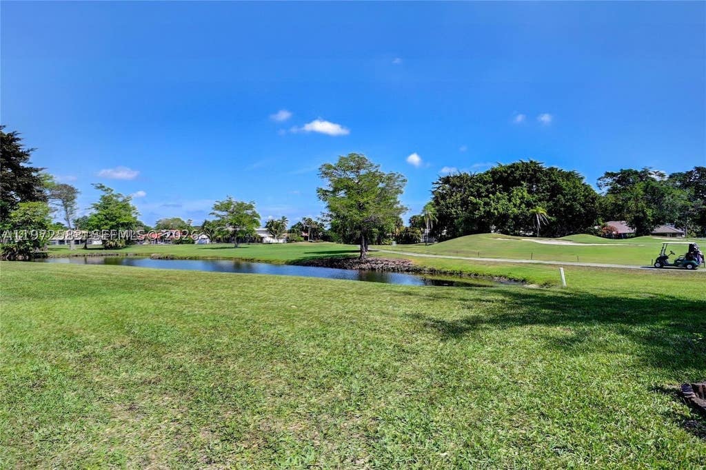 Photo of 7582 NW 86th Ter #104, Tamarac, FL 33321 (MLS # A11972583)