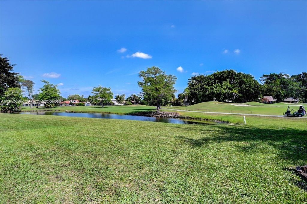 Photo of 7582 NW 86th Ter #104, Tamarac, FL 33321 (MLS # A11972583)