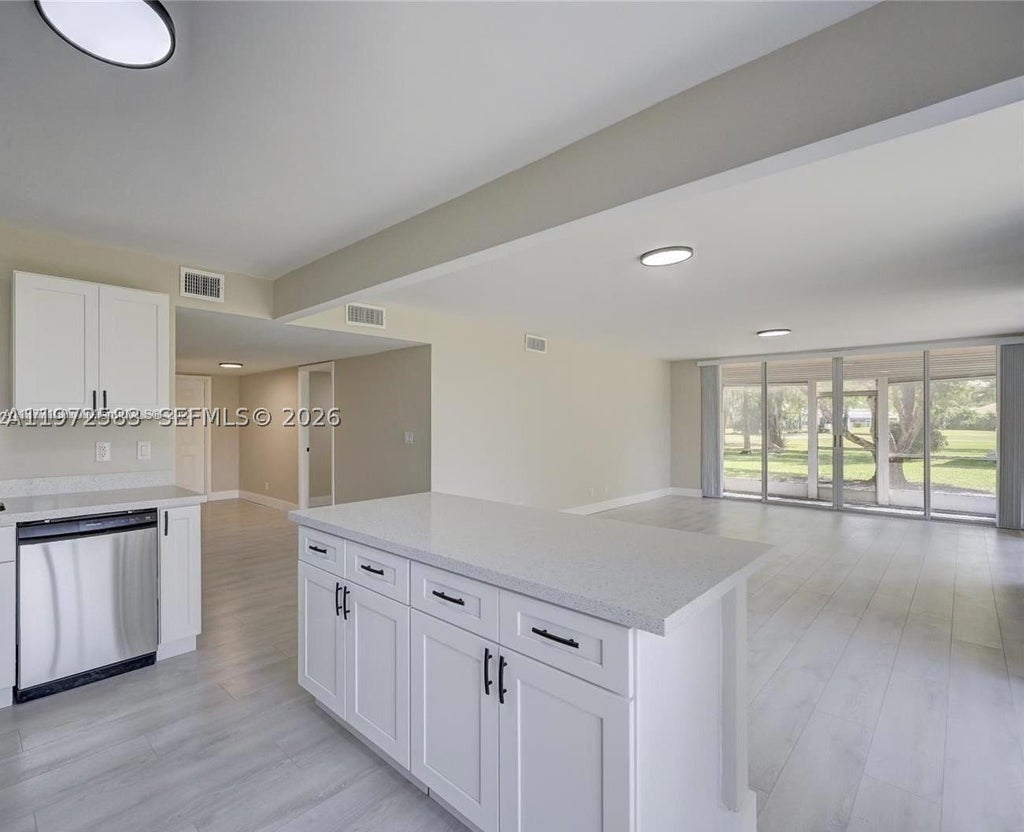 Photo of 7582 NW 86th Ter #104, Tamarac, FL 33321 (MLS # A11972583)