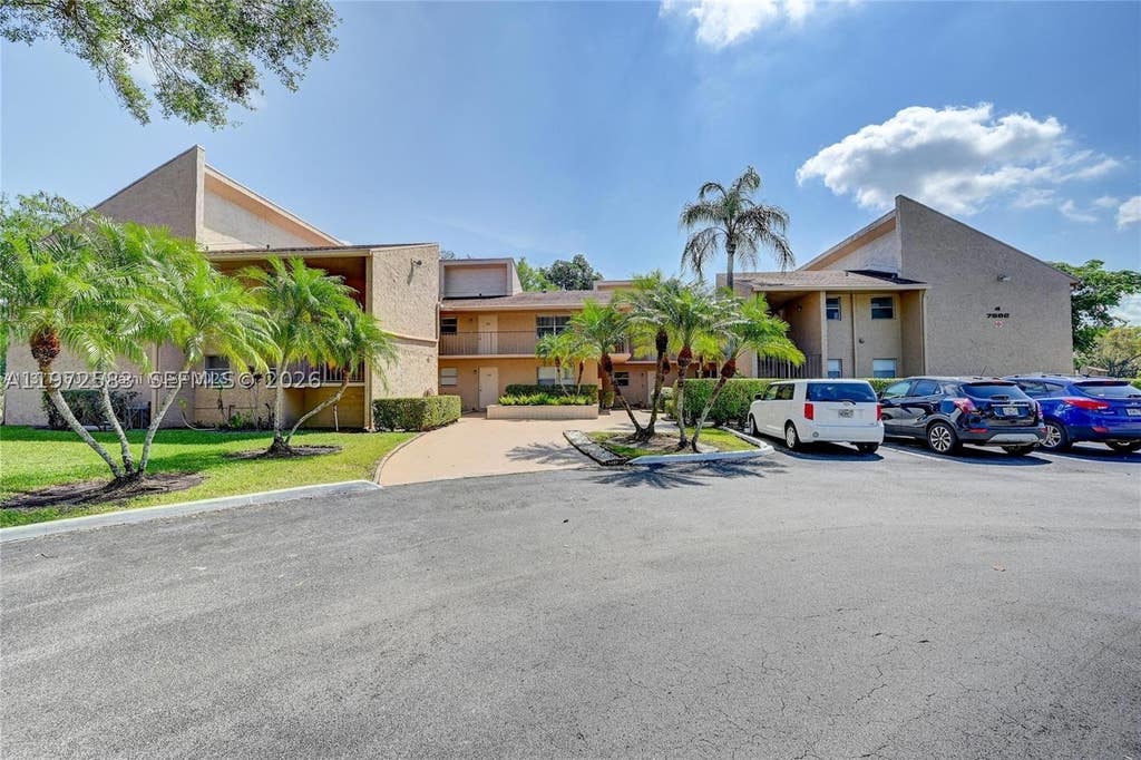 Photo of 7582 NW 86th Ter #104, Tamarac, FL 33321 (MLS # A11972583)