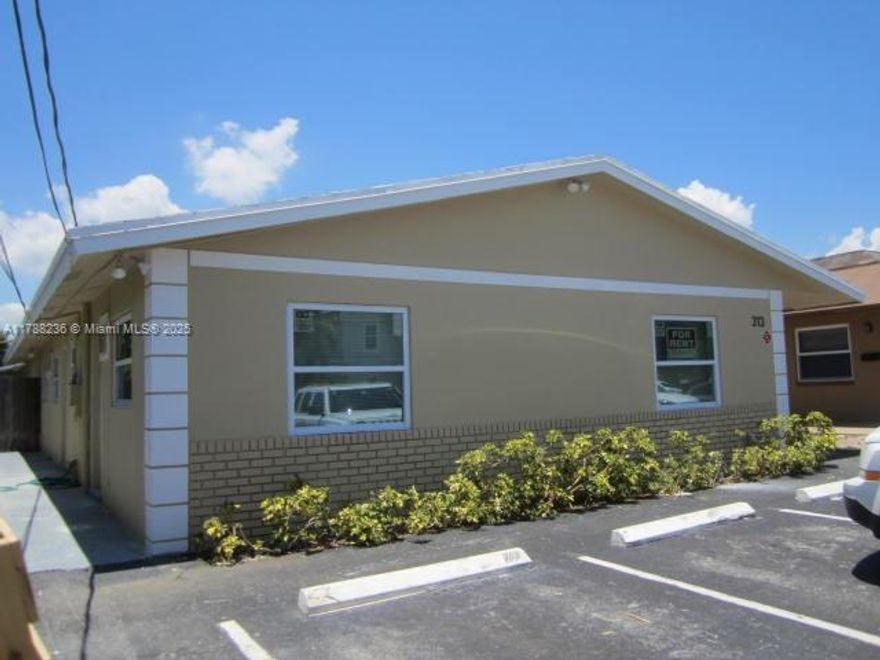 Investor's dream. 4 units each 1bed 1 bath. Fully rented to excellent tenants, yearly leases with Security Deposits. tenants pay for electric and internet.  New high impact windows. Washer Dryer lease. 4 tandem parking spaces. Gross rent $74,700 yr.  Owner's expenses:  water $3840,  lawn $600, real estate taxes 2024 $10955.52. Located a few blocks away from the prestigious KOI Residences and Marina, a mere 1.6 miles from the beach, close proximity to parks, golf courses, shopping, dining and entertainment. Tons of recent and up and coming redevelopments in the area. Please do not disturb tenants. Roof 2003.