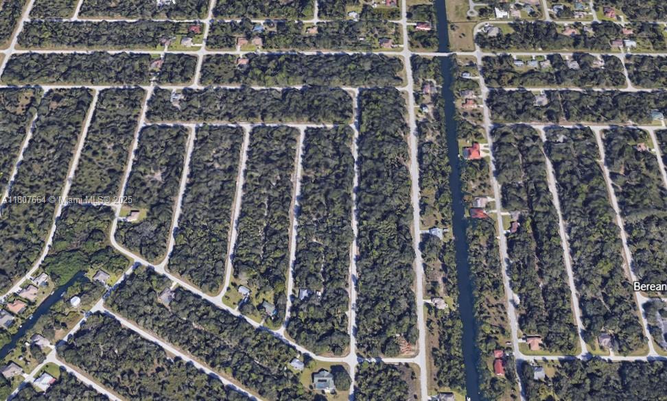 Don't miss out on this fantastic opportunity! Nestled in the serene neighborhood of Port Charlotte, this lot is the perfect canvas for your dream home. Enjoy leisurely strolls or invigorating bike rides through the tranquil surroundings or opt for a relaxing picnic by the charming Ollies Pond and Park. Located just a short drive from Englewood beaches, you'll have easy access to sun, sand, and sea whenever the mood strikes. For nature enthusiasts, Myakka River Regional Park beckons with its abundance of outdoor activities, including fishing, kayaking, and wildlife watching. Convenience is key with the Tampa Bay Ray's Training facility just around the corner, along with an array of amenities including golf courses, shopping centers, and delectable dining options.