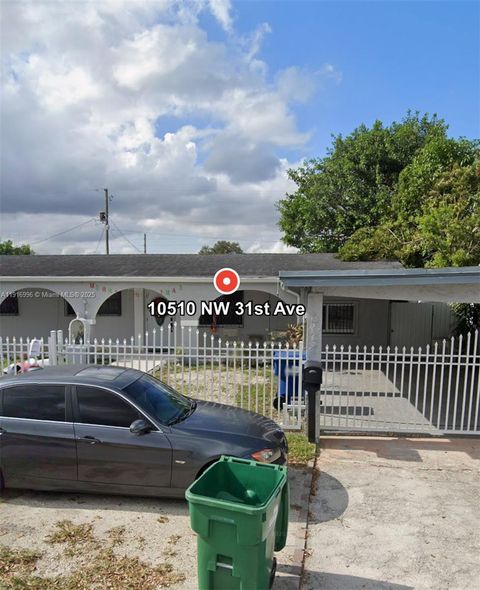 Photo of 10510 NW 31st Ave, Miami, FL 33147 (MLS # A11916996)