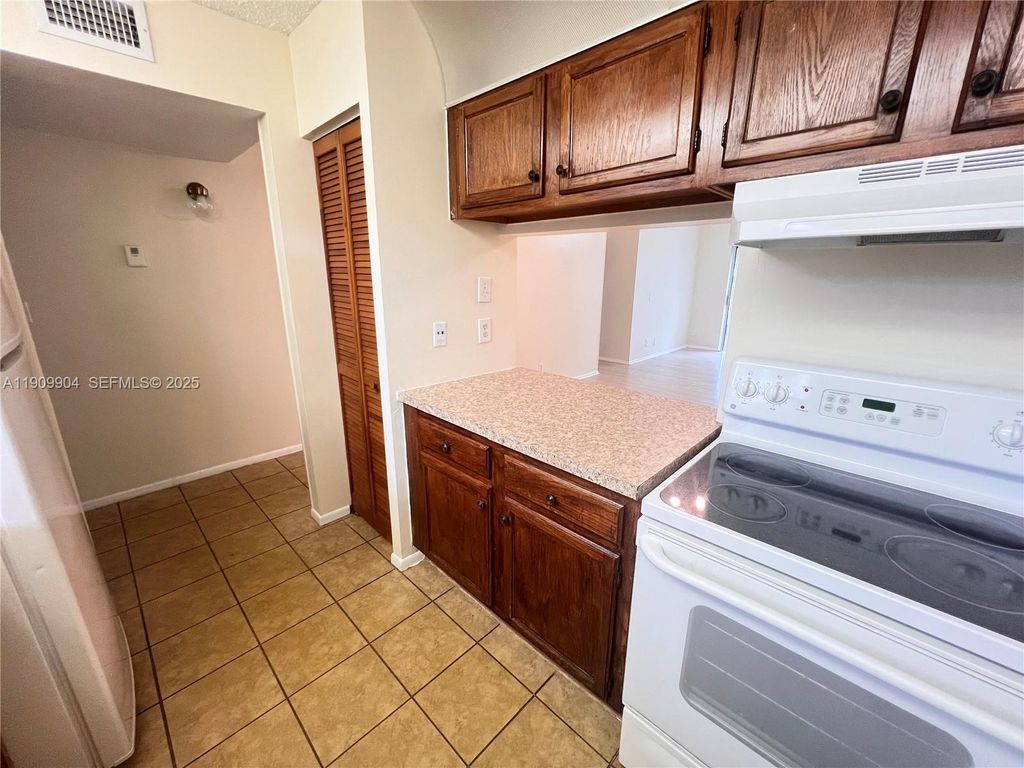 Photo of 11441 NW 39th Ct #117-3, Coral Springs, FL 33065 (MLS # A11909904)