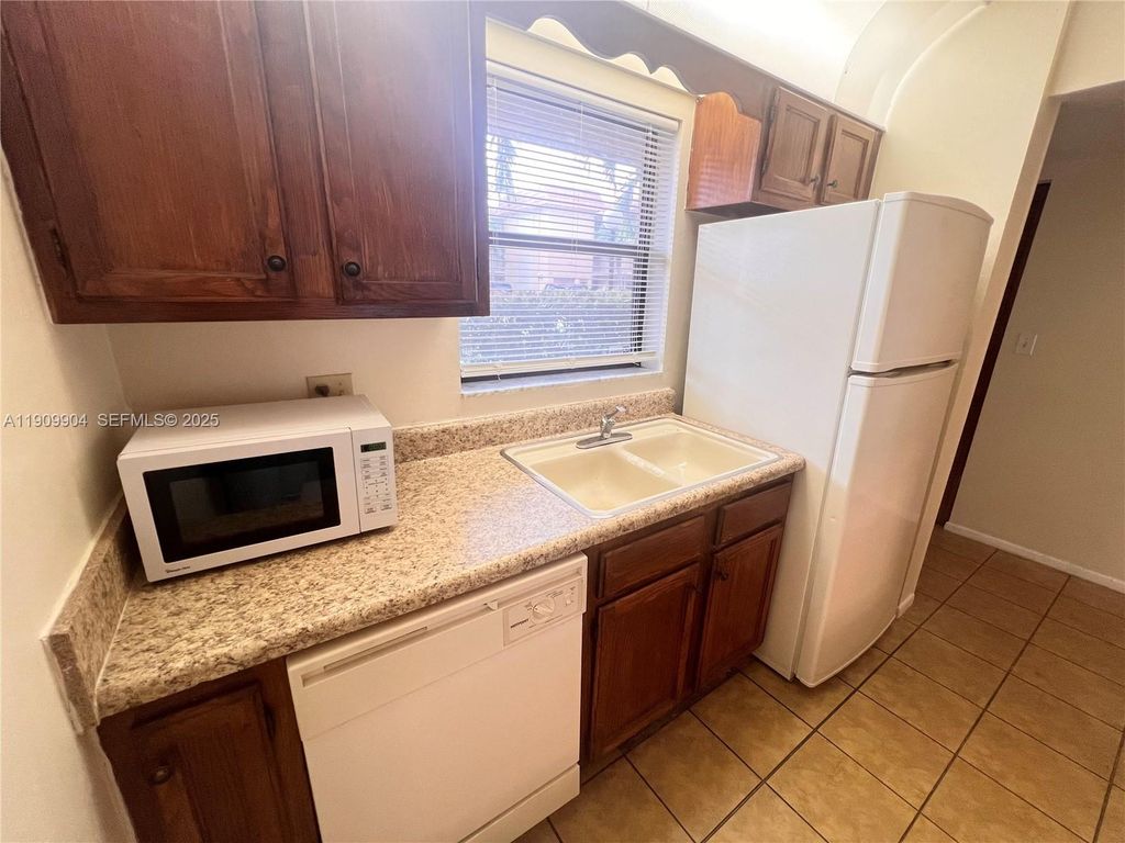 Photo of 11441 NW 39th Ct #117-3, Coral Springs, FL 33065 (MLS # A11909904)