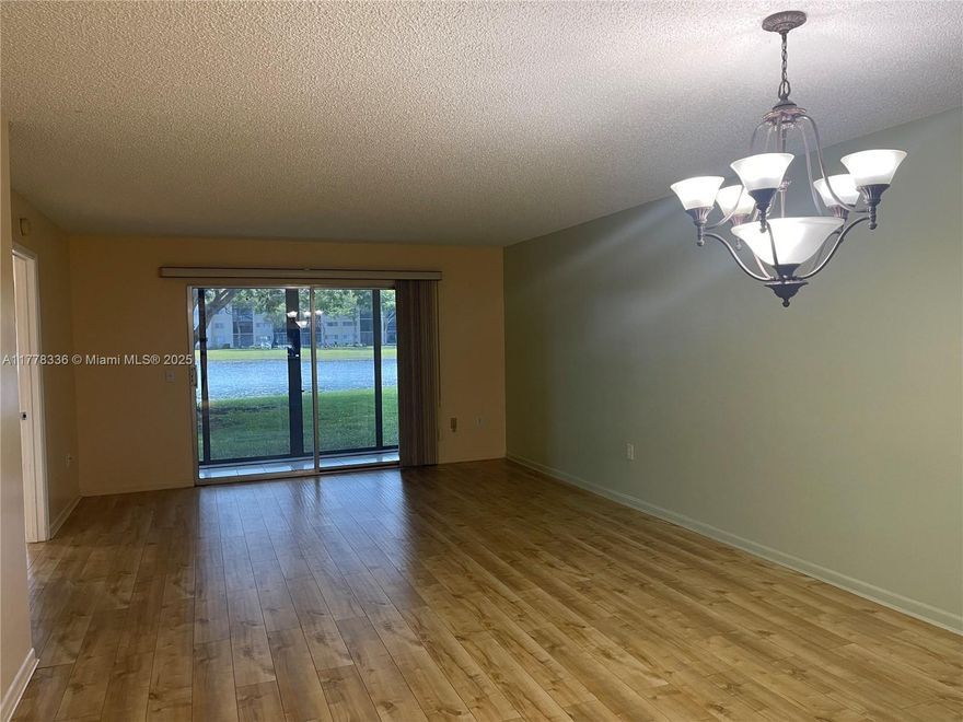 Welcome to your serene sanctuary nestled in the heart of Pembroke Pines, FL. As you step into this exquisite 2-bedroom, 2-bathroom condo, you are immediately enveloped by the warmth and elegance that this corner-like unit exudes. Imagine waking up to the tranquil water views. All tile flooring throughout the home and updated kitchen with a touch of sophistication and ensures easy maintenance, allowing you more time to indulge in the pleasures of life. This guarded community is not just a place to live; it's a lifestyle. With an array of amenities at your fingertips, every day feels like a vacation. Whether you're looking to stay active or simply relax, this community caters to all your desires.