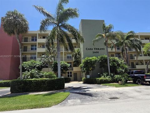 Photo of 2400 NE 10th St #104, Pompano Beach, FL 33062 (MLS # A12023777)
