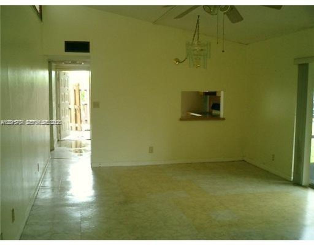 Photo of 5702 Swordfish Cir, Tamarac, FL 33319 (MLS # A12015784)