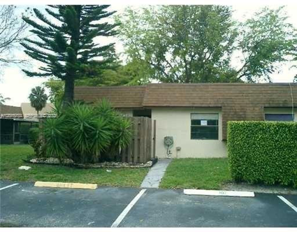 Photo of 5702 Swordfish Cir, Tamarac, FL 33319 (MLS # A12015784)