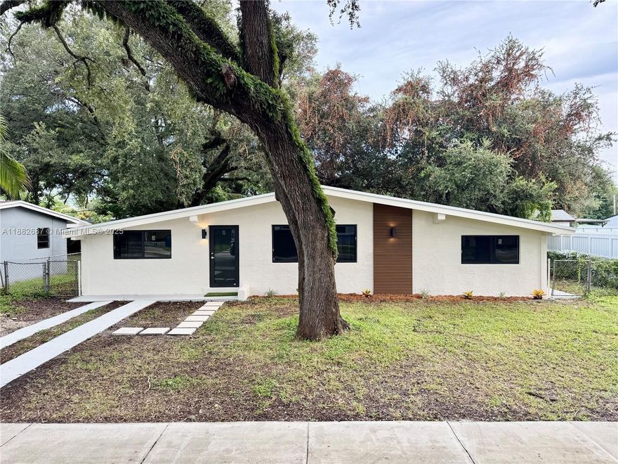 Completely remodeled 4-bedroom, 2-bath home in the heart of Miami Gardens! This move-in ready gem features a brand new roof, full impact windows/doors, a modern kitchen with quartz countertops, and stylishly updated bathrooms. Larger than tax roll (1,243 sq/ft living). The spacious layout includes a versatile 4th bedroom currently used as a den, easily convertible back to a bedroom. Enjoy peace of mind, comfort, and style all in one. Conveniently located near schools, shopping, and major highways. Don’t miss this incredible opportunity!