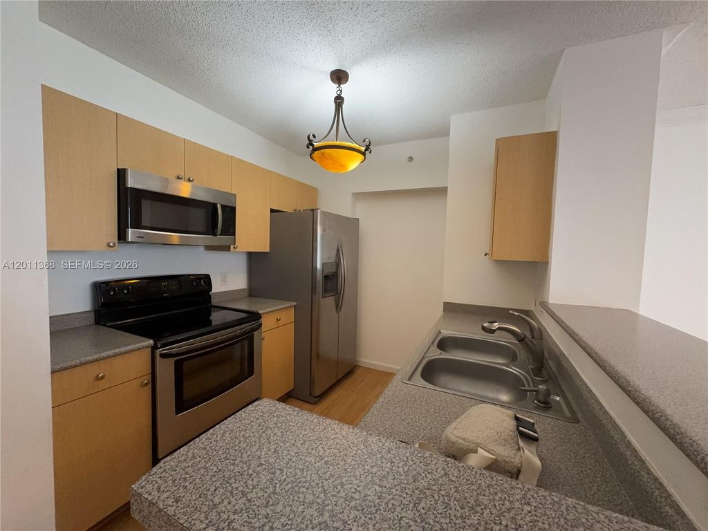 Photo of 1919 Van Buren St #403A, Hollywood, FL 33020 (MLS # A12011368)