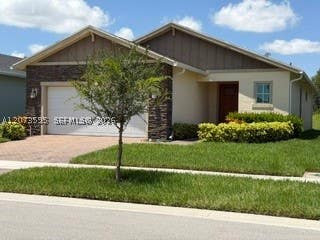 Photo of 556 SE Mulberry Way, Port St Lucie, FL 34984 (MLS # A12073595)