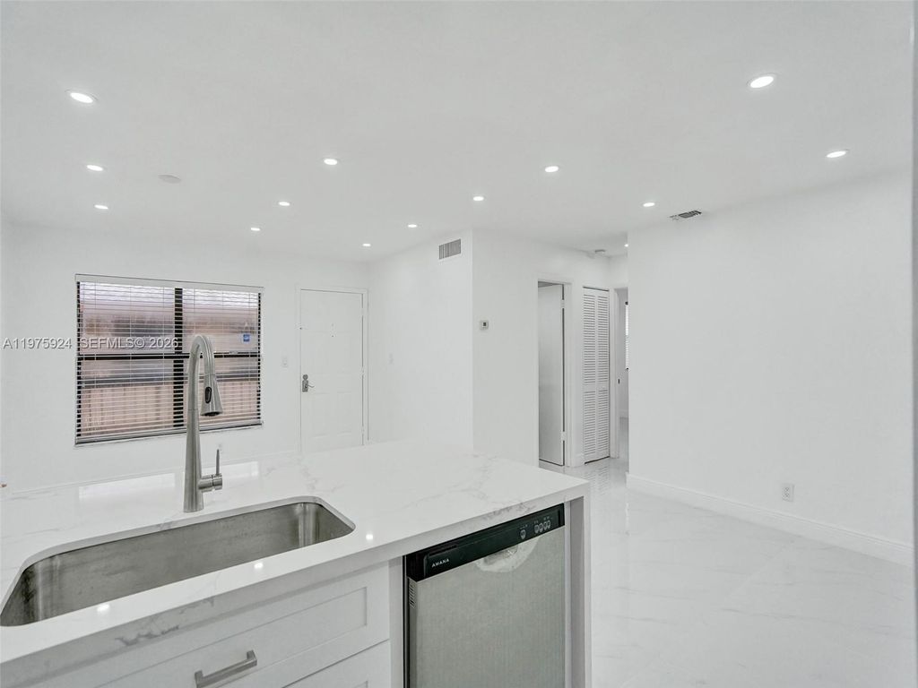 Photo of 10051 Winding Lake Rd #201, Sunrise, FL 33351 (MLS # A11975924)