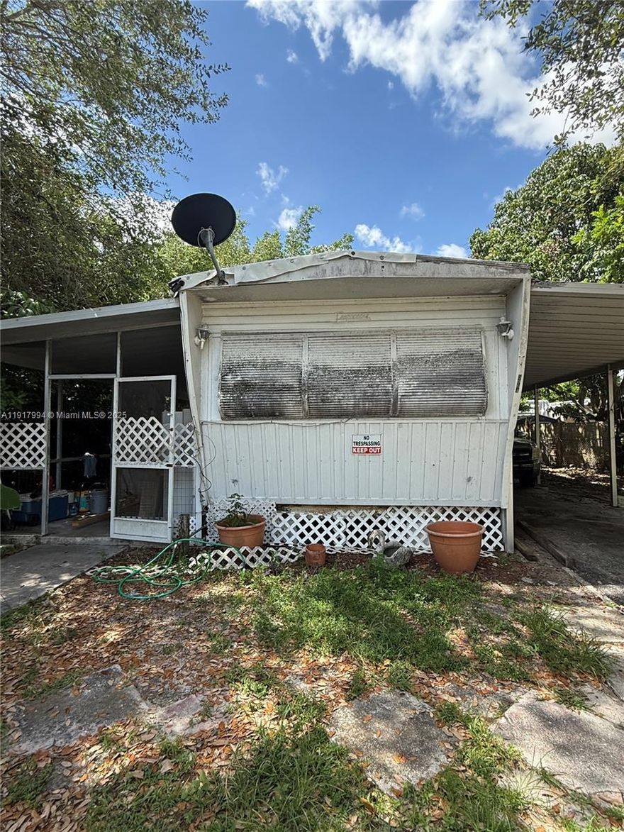 Opportunity is knocking.  This mobile home community has NO HOA and you own your own lot.  Could be a great opportunity for someone with their own mobile home to stop paying land-use fees elsewhere. Cash only sale, as property is selling for land value only.  There is a dilapidated mobile home on the lot.  Zoned Mobile Home, but also Multi-family.  Great option for small builders, as 2 new homes were built across the street and you could build one to.  Buyer to do their own due diligence prior to  Buyer will assume all fines, code violations, and the removal of the mobile home at time of closing. Seller will select title company and pay for title policy.