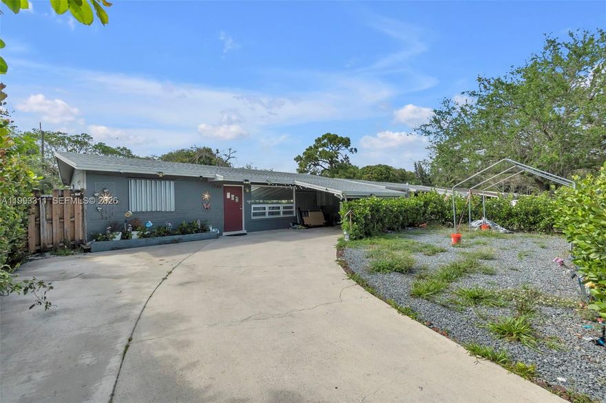 Charming 3-bedroom, 2-bath home with a functional split floor plan, carport, and spacious driveway! This well-maintained property features a brand-new roof, new water heater, and approximately 7-year-old AC for added peace of mind. Interior highlights include tile flooring throughout with terrazzo in the bedrooms, a spacious family room, and stainless steel appliances including refrigerator, stove, and dishwasher. The home is equipped with full hurricane shutters and a newly installed electrical service line from FPL. Enjoy outdoor space with a powered shed in the backyard—perfect for storage or a workshop. Great opportunity offering comfort, value, and versatility!