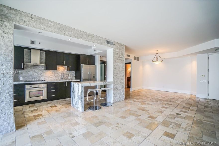 Substantially remodeled large two bedroom with Chef's style open kitchen. Stainless steel appliances, oversized balcony offering mesmerizing water and city views.