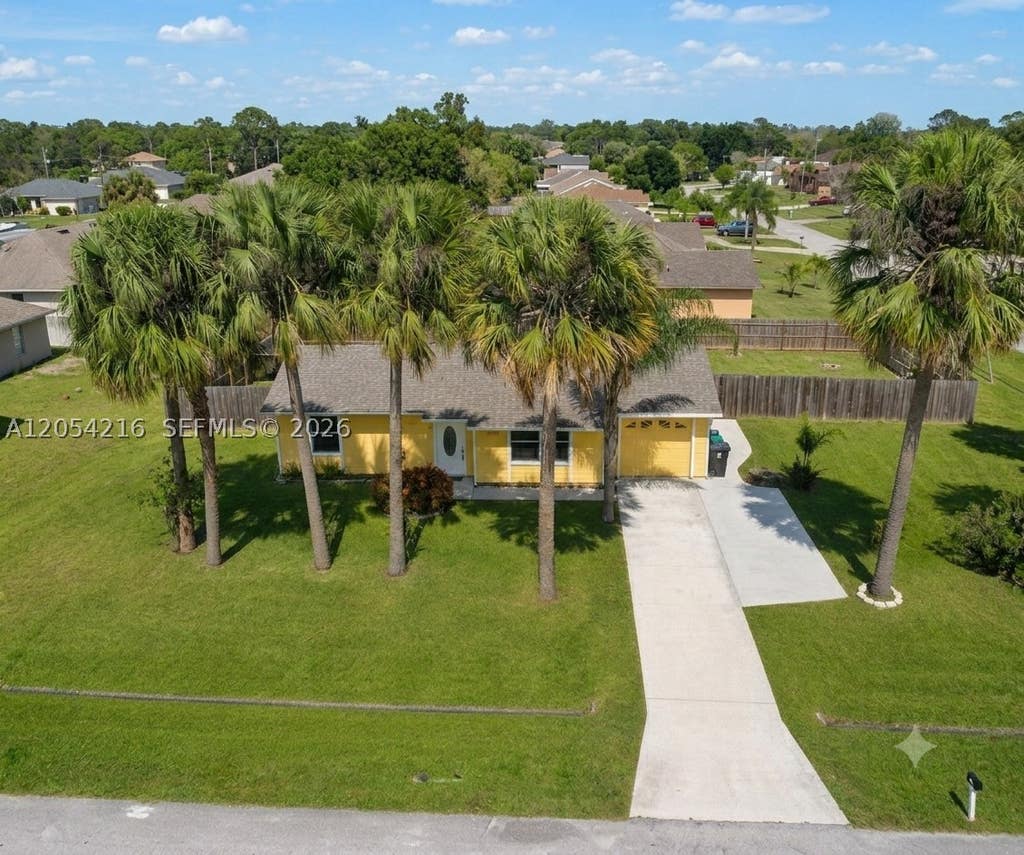 Photo of 1573 SW Lexington Dr, Port St Lucie, FL 34953 (MLS # A12054216)