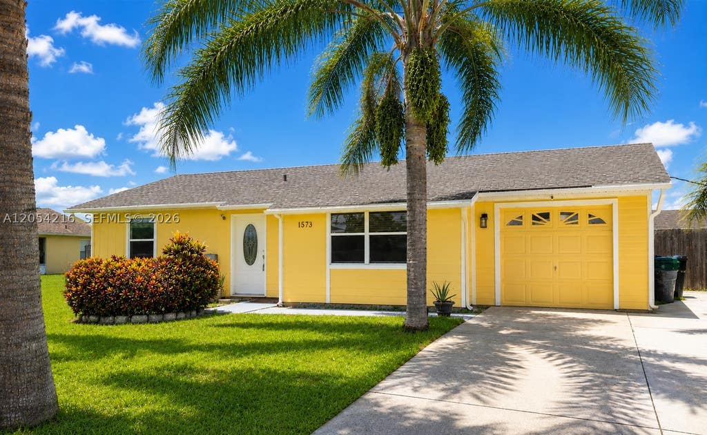 Photo of 1573 SW Lexington Dr, Port St Lucie, FL 34953 (MLS # A12054216)