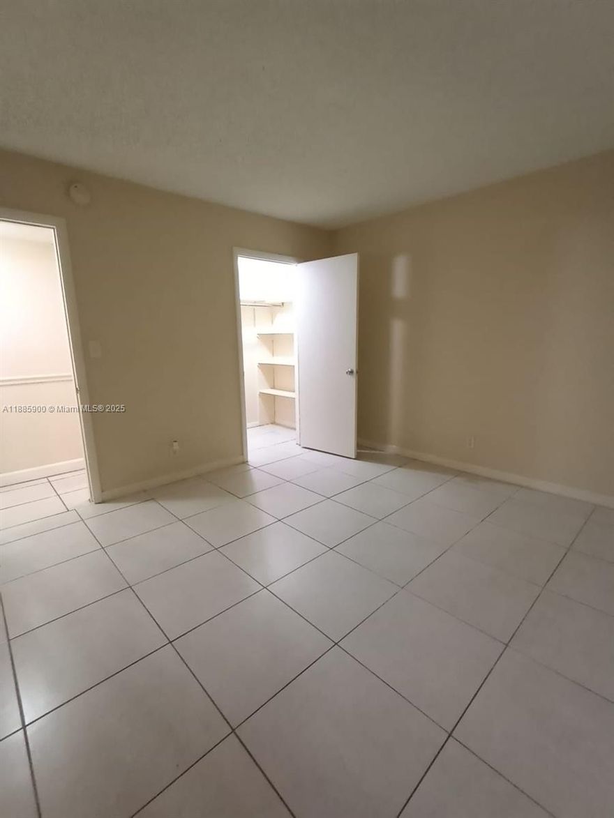Spacious 2-bed 2-bath corner condo, gated community in the heart of Plantation. Washer and dryer inside the unit. Large screened patio overlooking the canal. Cozy breakfast nook, ceramic flooring throughout. One parking spot, ample guest parking. Amenities include great pool, clubhouse, gym, sauna, tennis court. Pet friendly, under 30 lbs. Centrally located, close to highways, Ikea, Sawgrass Mills Mall. NOTE: To visit this unit, please, park outside of the gate, where it stated guest parking. You will see a sidewalk on the side of the clubhouse, leading you towards the inside of the property. Look for building 430, which is the middle building.