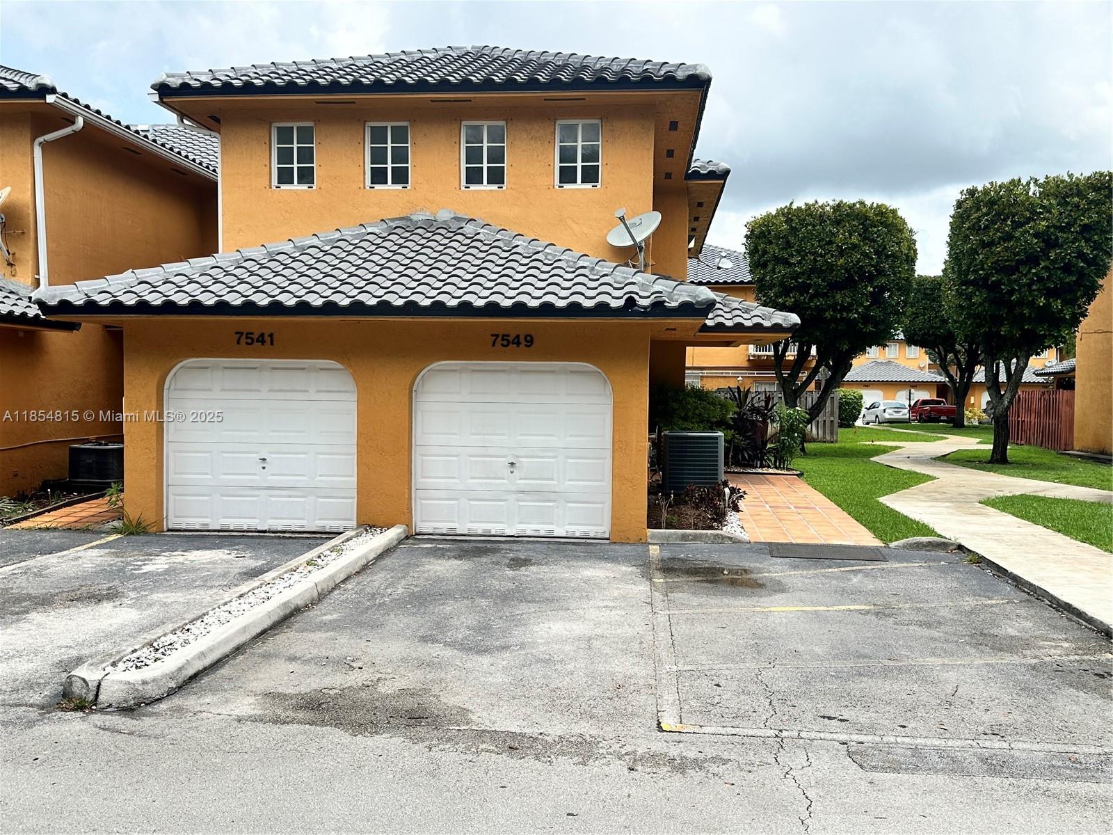 Located in a prime area, this spacious 3-bedroom, 2-bathroom corner townhouse in Lilandia Estates is ready for a new owner. The home features an attached one-car garage and full tile flooring throughout, creating a clean and modern aesthetic. The open floor plan includes a large kitchen with a lunch counter, a spacious laundry room, and a tankless water heater. With numerous windows, the townhouse is filled with natural light. It also comes with a private driveway and additional guest parking. Situated on the upper level, the home boasts
an incredibly large loft/family room, perfect for relaxation or entertainment. This private community has a low HOA fee. The location is fantastic, providing easy access to the Palmetto Expressway, I-75, and the Turnpike Expressway.