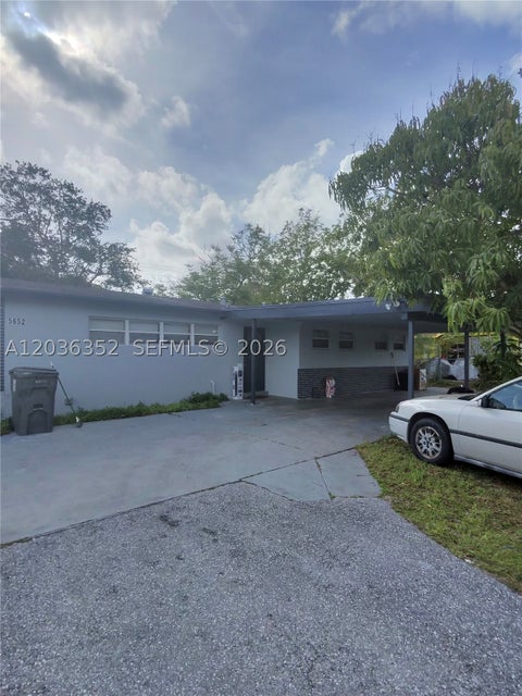 Photo of 5652 Parke Ave, West Palm Beach, FL 33407 (MLS # A12036352)