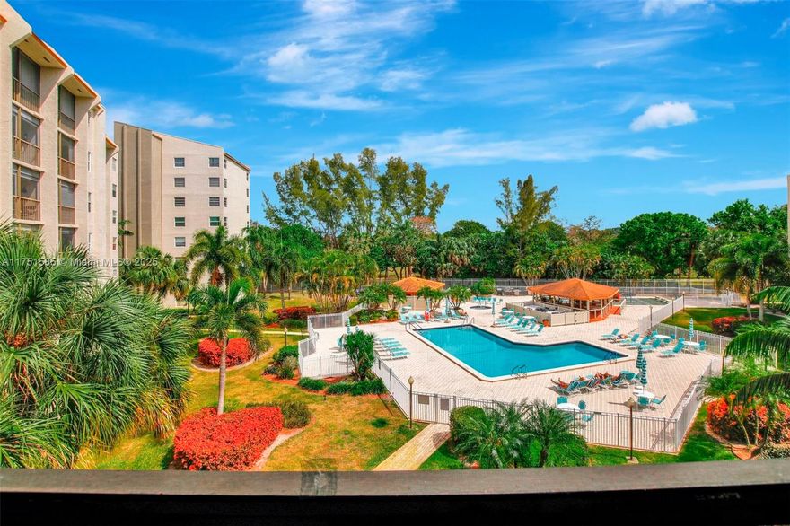 Stunning completely renovated 2/2 condominium for sale in a desirable 55+ community! Enjoy breathtaking views of the pool area and gazebo from this spacious condo. Sold fully furnished for your convenience. The open kitchen has been beautifully remodeled with granite counters, . Additional features include large Italian porcelain tiles throughout, impact windows, washer and dryer in unit, and a spacious master bedroom. Both bathrooms have been completely renovated with modern finishes. Residents enjoy a luxurious lifestyle with access to a heated pool, exercise machines, BBQ area, pickle ball and tennis courts, and 24/7 guarded gate. Cable TV, HBO, and internet are included in the maintenance fee.