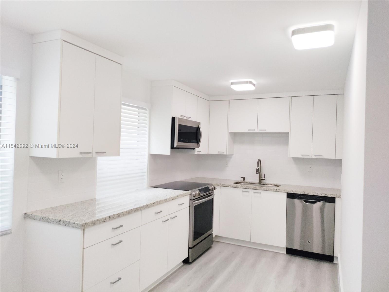 KINGS POINT BURGUNDY COND - Residential