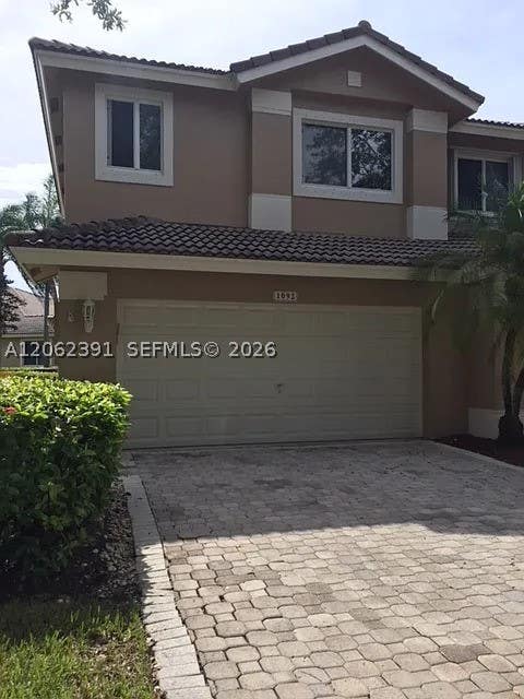 Photo of 1092 SW 158th Ave, Pembroke Pines, FL 33027 (MLS # A12062391)