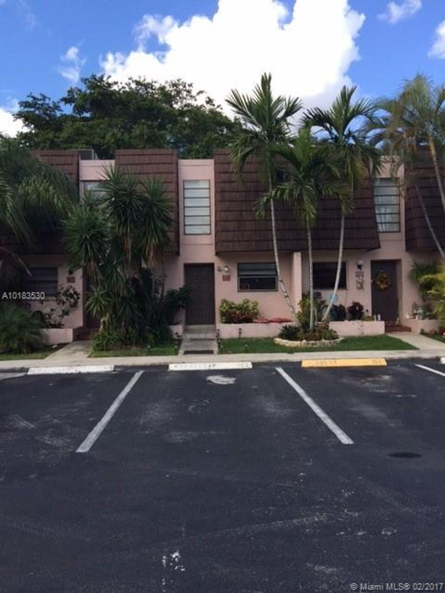 2 Bed & 2.5 Bath Townhome with a Large Screened in Patio overlooking a Beautiful Lake. Updated Kitchen Cabinets, with Blue Pearl Countertops and Stainless Steel Appliances. Impact Glass Windows on the First Floor Level. Tile Floor Downstairs and Wood on Stairs and Second Floor. Oversize Master Bedroom with a Wall to Wall Closet. Master Bath has new Tile, Plumbing and Toilet. All Three Bathrooms have New Toilets. Electrical Outlets, Trims and Blinds are updated. Elementary, Middle School and Shoppes near.