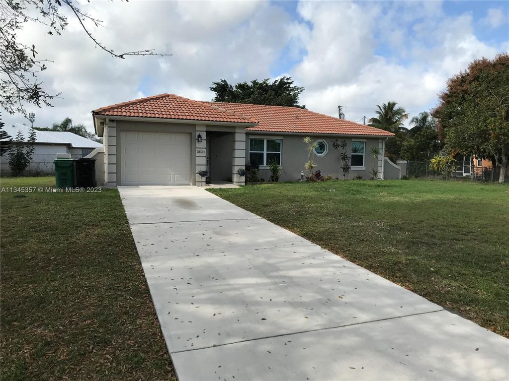 Photo of 265 SW Dalton Cir, Port Saint Lucie, FL 34953 (MLS # A11345357)