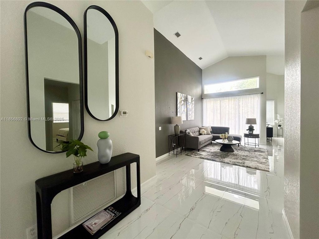 Photo of 5776 NW 56th Mnr, Coral Springs, FL 33067 (MLS # A11856802)