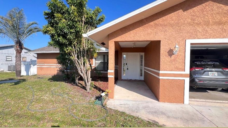 Welcome to this charming 3-bed, 2-bath home in the heart of Port St. Lucie, offering comfort, space, and convenience. Boasting approximately 1,858 sq. ft. of living space, this well-maintained home features an open floor plan with a spacious kitchen flowing seamlessly into the living and dining areas—perfect for entertaining. The generously sized bedrooms provide ample closet space, while tile flooring in the main areas ensures durability. The property also offers a screened porch and plenty of outdoor space for relaxation! Conveniently located near top-rated schools, parks, shopping, and dining, this home is an ideal choice for families or professionals seeking a blend of comfort and accessibility. Roof was replace in 2025. Don’t miss this opportunity!