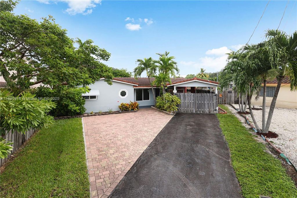 Photo of 1831 NW 33rd St, Oakland Park, FL 33309 (MLS # A11895978)