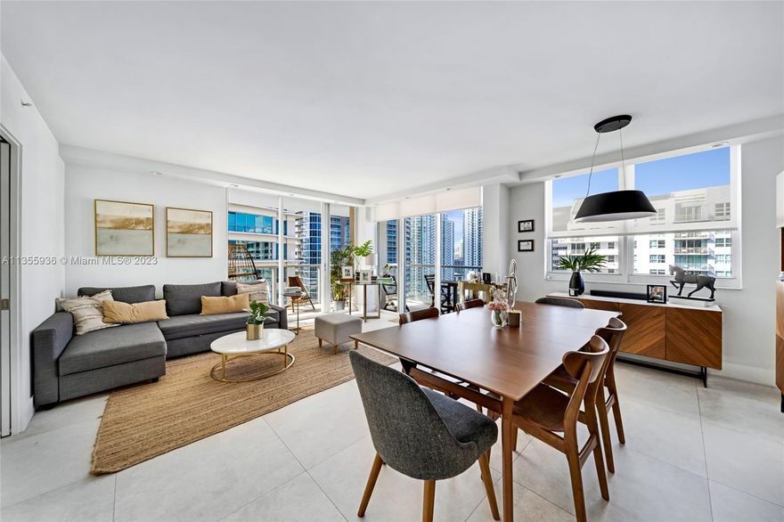 Fully renovated residence with amazing skyline and ocean views. This corner unit has an abundance of natural light and an intelligent new layout with a much more functional design. Owner renovations include new bathrooms, new open kitchen with custom quartz counters, wine fridge, new appliances, new AC, new washer/dryer, built in closets, an ample amount of storage and much more. The building offers 5 star amenities including large swimming pool, outdoor hot tub, tennis court, BBQ area, gym, 24-hour concierge, on-site restaurant, convenience store and so much more. Water, basic cable & internet included. One assigned parking space with option for more.