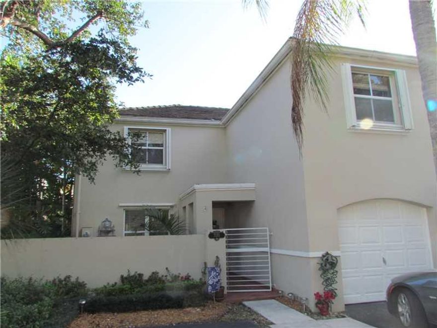 LOCATION! SOUGHT AFTER BRIDGEPOINT, GREAT CORNER UNIT, HIGH CEILINGS, Totally updated with exquisite taste. 3 BEDROOMS, 2.5 BATHS, Gorgeous Brazilian cherry wood floors.  BACK PATIO OVERLOOKING LAKE. Amenities are pool, tennis and exercise room. This unit  is located near the pool w/plenty of guest parking and your private 1 car garage.