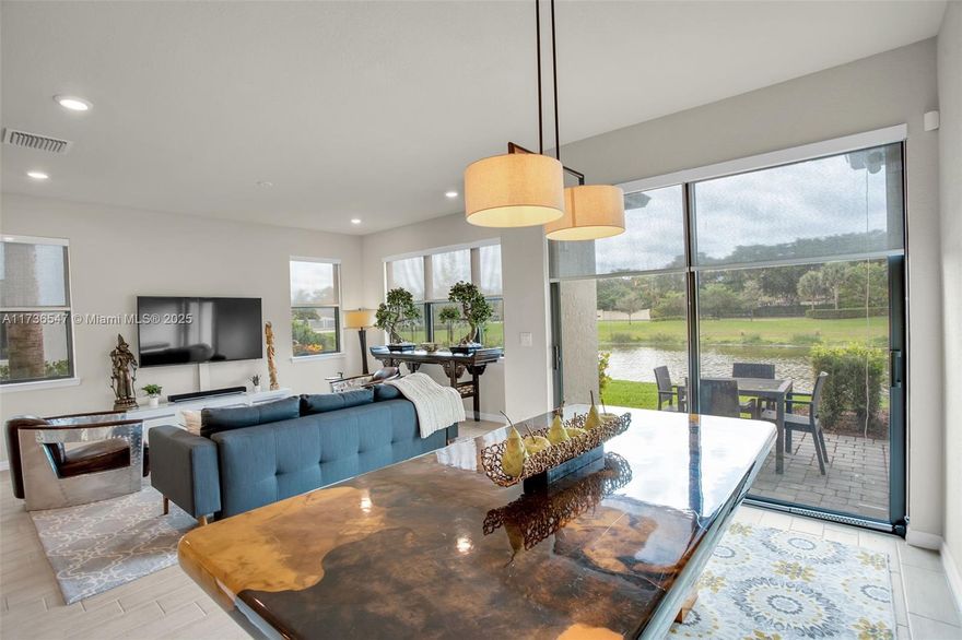 Rare Lakefront Corner Unit in the Exclusive Newly Constructed Community of Oak Tree w/ resort-style amenities! 

Discover the perfect blend of luxury, privacy, and resort-style living in this sought-after corner townhome in the gated Oak Tree community. Tucked away at the entrance of a quiet cul-de-sac, this extended-lot home offers breathtaking lake views with zero sightlines to neighbors, maximizing privacy.

This home features an open-concept design, wood grain tile flooring, and a chef’s kitchen with an extended island—ideal for entertaining. The primary suite boasts double walk-in closets and stunning lake views, while custom blackout shades upstairs and light-filtering roller shades downstairs enhance comfort. A 2-car garage and ample storage completes this exceptional home.