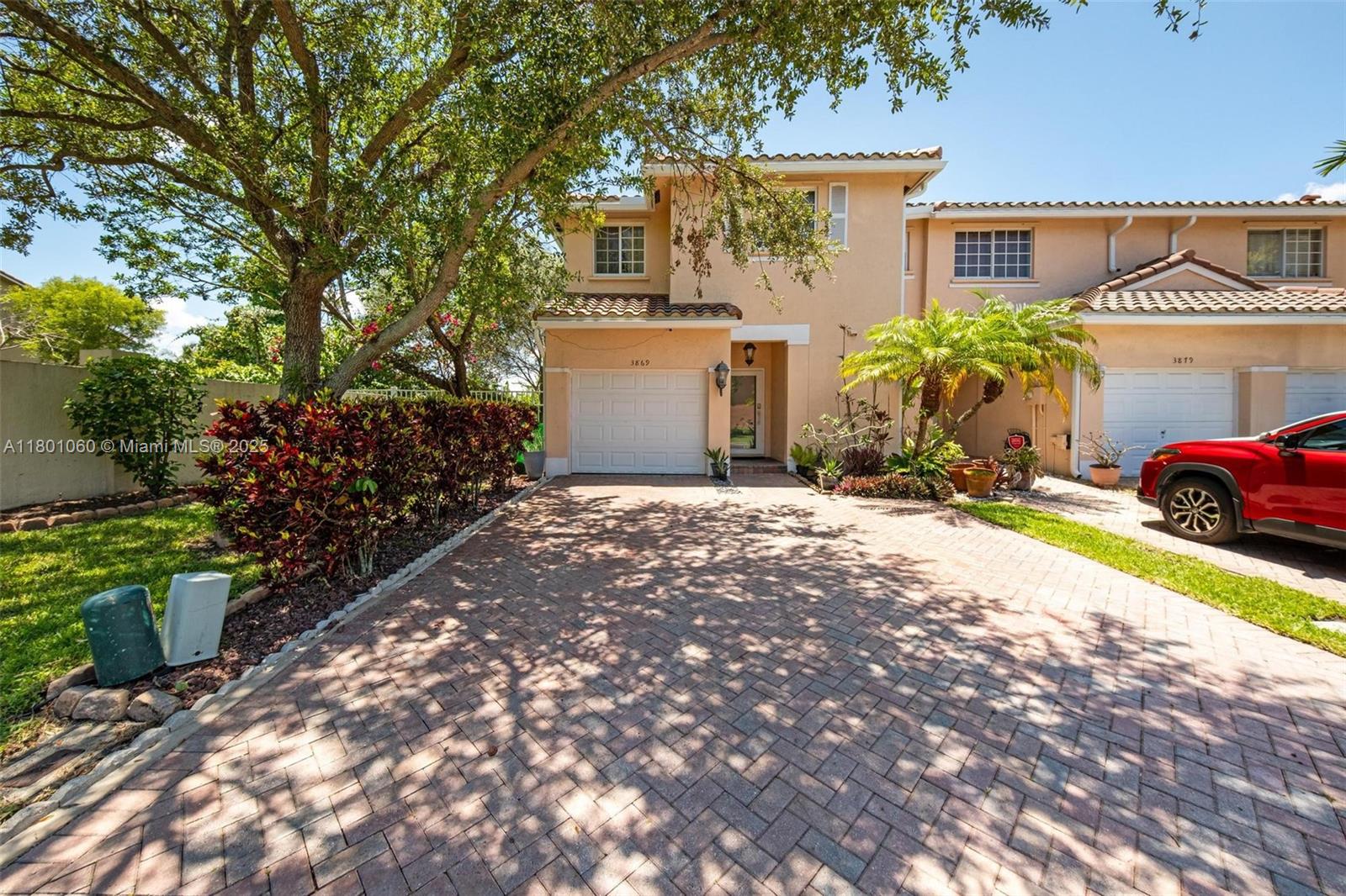 Spacious 4BD/2.5BA Corner townhome in Southwind Cove with vaulted ceilings, water views, and open-concept layout. Major upgrades include new roof (2025), gutters (2025), LG washer/dryer (2025), A/C (2017), and impact windows/doors. Kitchen features LG fridge & new garbage disposal. Bathrooms updated and nice large primary walk-in closet. All bedrooms are upstairs. HOA covers ADT security, sprinkler repair & exterior painting. Community pool, playground & low fees.