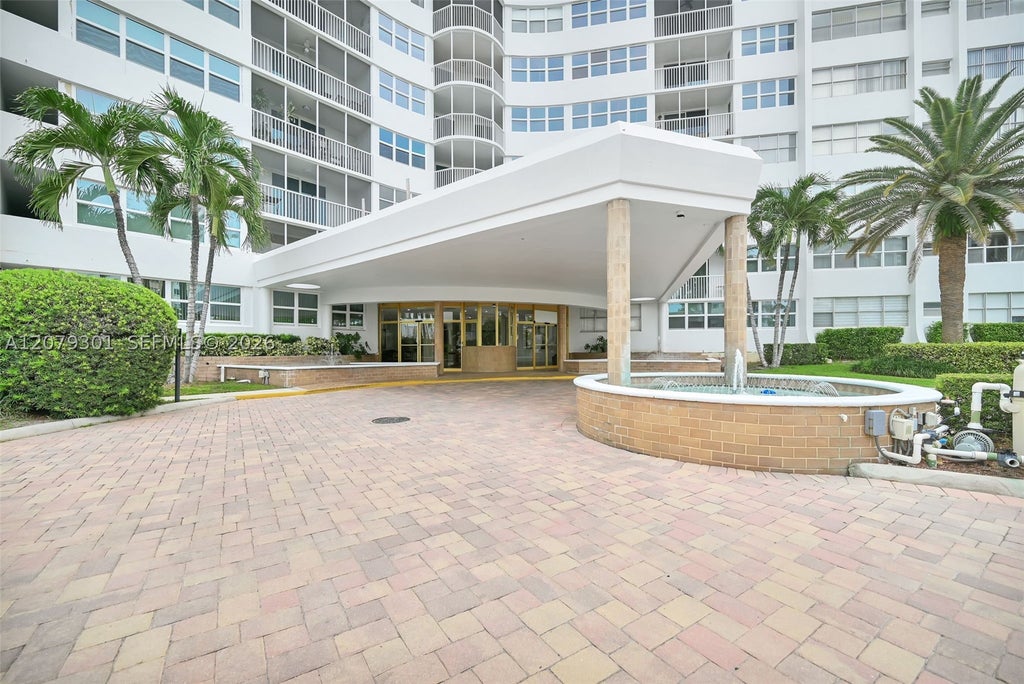 Photo of 100 Golden Isles Dr #109, Hallandale Beach, FL 33009 (MLS # A12079301)