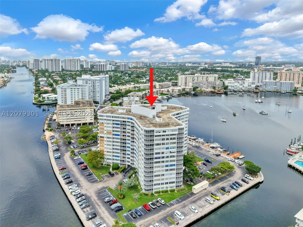 Photo of 100 Golden Isles Dr #109, Hallandale Beach, FL 33009 (MLS # A12079301)