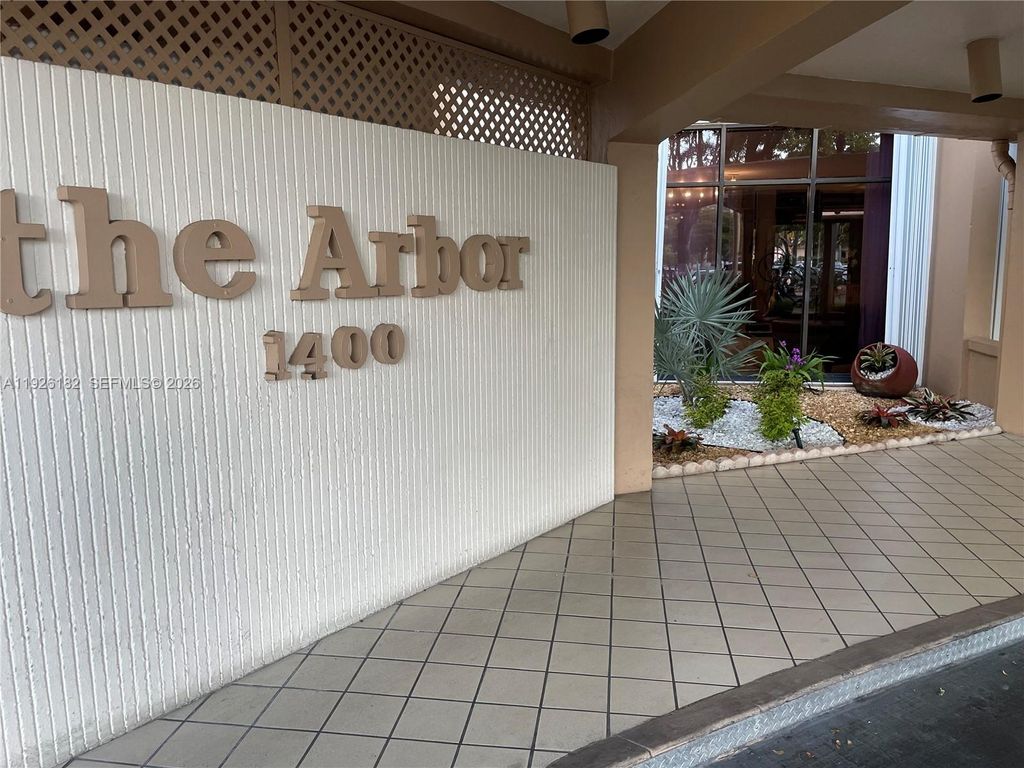 Photo of 1400 Saint Charles Pl #505, Pembroke Pines, FL 33026 (MLS # A11926182)