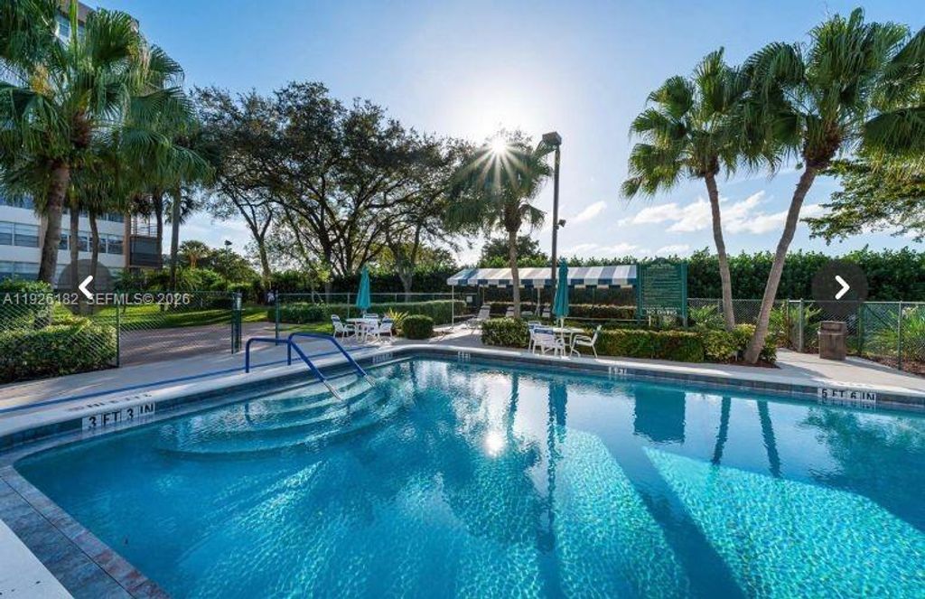 Photo of 1400 Saint Charles Pl #505, Pembroke Pines, FL 33026 (MLS # A11926182)