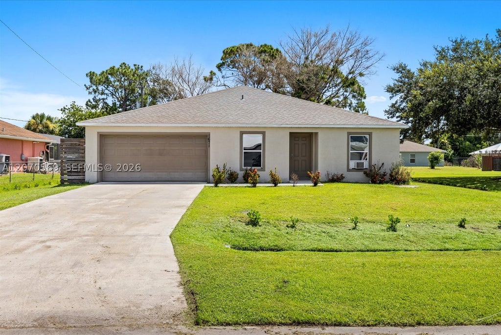 Photo of 1671 SE Seashore Ln, Port St Lucie, FL 34983 (MLS # A12070569)