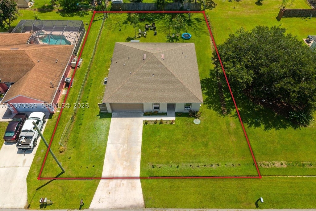 Photo of 1671 SE Seashore Ln, Port St Lucie, FL 34983 (MLS # A12070569)
