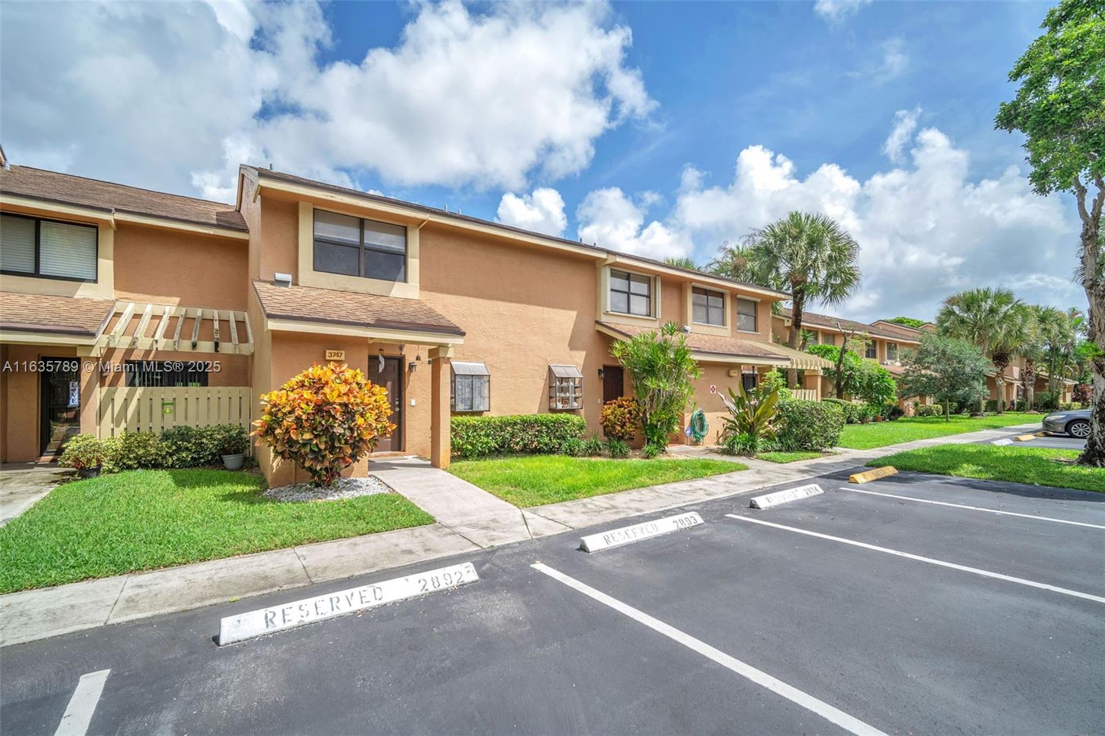 Beautifully renovated and maintained 2 Bedroom/2.5 bathroom townhome in the sought-after Township community, in Coconut Creek. The spacious living/dining area opens to an enclosed patio that offers relaxing and quiet water views! The updated kitchen features white cabinets, GRANITE countertops, and stainless steel appliances. Half bathroom downstairs, and upstairs features two master suites boasting vaulted ceilings. Stylish wood-grain TILE flooring throughout the home. In-unit laundry and EXTRA storage add convenience. Not a CONDO, easy to finance. HOA covers landscaping, cable, roof and building insurance. Enjoy Township amenities including an Olympic-sized pool, fitness center, tennis, pickleball, theater, etc. Close to highways, shopping, and the beach! Schedule your showing today!