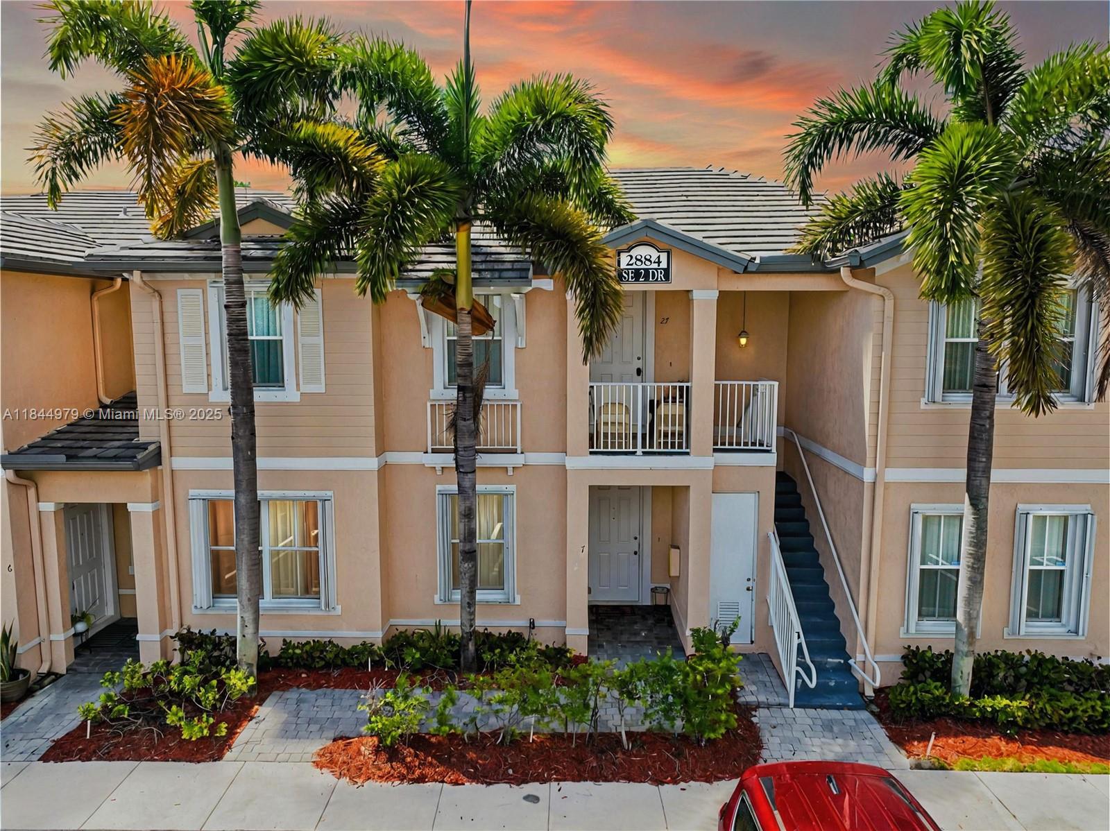 HOA APPROVED FOR 5% DOWN PAYMENT! Beautiful 3-bedroom and 2 full bathrooms, ground floor condo/townhouse in the gated community of Fiji at Isles at Oasis. This bright, open floor plan is filled with natural light and features tile and wood-look laminate flooring.The unit has been very well maintained and offers a nicely sized, functional kitchen with a stainless steel vent hood.A brand-new AC unit ensures year-round comfort. The spacious master suite includes a walk-in closet and an en-suite bathroom. Enjoy resort-style amenities like an Olympic-sized pool, clubhouse, gym, and walking trails. Conveniently located just minutes from the Florida Turnpike, Homestead Air Reserve Base, Baptist Hospital, Target, Publix, and Chick-fil-A. Don’t miss the 3D virtual tour. May the Force be with you!