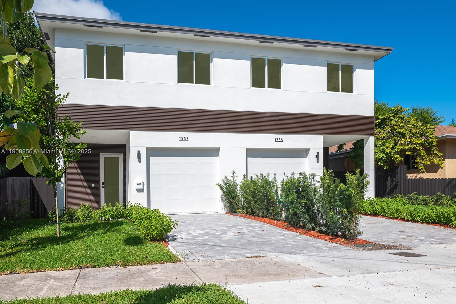 Brand-new 2025 modern twin homes just minutes from Wynwood, Midtown, the Design District, and Brickell! Each residence offers 3 bedrooms, 2.5 baths, a 1-car garage, and an open-concept layout filled with natural light. High-end finishes throughout include Italian porcelain flooring, European-style kitchen with quartz countertops & stainless steel appliances, impact glass, and vinyl waterproof flooring upstairs. The spacious master suite features a large walk-in closet and elegant bathroom. Enjoy a large private backyard perfect for entertaining. Built with quality and style, these homes offer the perfect blend of comfort and convenience in one of Miami’s most connected locations. Both units can be purchased together for an excellent investment or Airbnb opportunity.