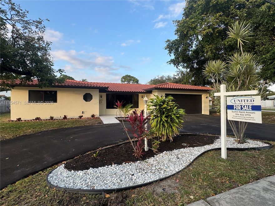 Welcome to this beautifully updated 2-bedroom, 2-bathroom home with a 2-car garage and circular driveway, located in the highly desirable Cove neighborhood of Deerfield Beach. Situated on an oversized corner lot, this home is just a short distance to The Cove Shopping Center, marina, sand, ocean, restaurants, and shops.
 
The home features all hurricane impact windows and doors, 2018 roof, freshly painted interior and exterior, tile floors in living and dining areas, and laminate flooring in the bedrooms. Updated kitchen with Corian countertops and remodeled bathrooms with upgraded finishes make this home move-in ready.
Prime corner-lot location, minutes from the beach—ideal for investors or short-term rentals with No HOA.