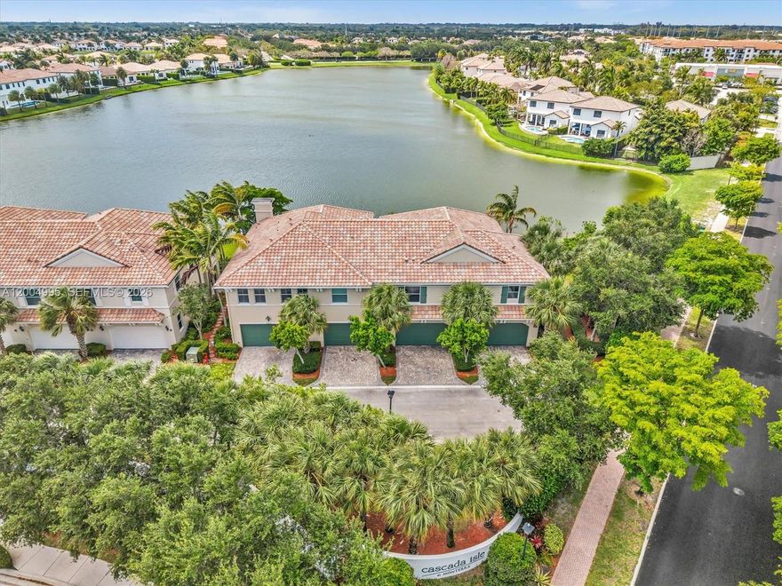 Rare waterfront townhome in Cooper City, Florida, located in the highly sought-after gated community of Cascada Isles. This Avila model offers 2 bedrooms, 2 bathrooms, plus a loft and nearly 1,800 sq ft of living space. Situated on a premium corner lot with spectacular, unobstructed lake views, this home features hurricane impact windows and a 2-car garage. Enjoy resort-style living with full access to Monterra amenities, including a clubhouse, fitness center, tennis courts, basketball courts, and scenic walking trails. Zoned for A-rated Cooper City schools, one of the top school districts in Broward County.  With surrounding homes in Monterra typically ranging from $1M to $2M+, this is a rare opportunity to own a waterfront home in Cooper City at an exceptional value.