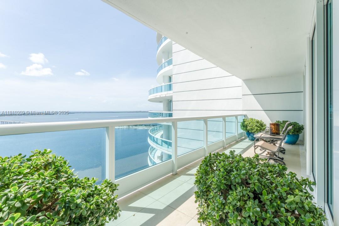 Step into this elegant corner residence at the iconic Bristol Tower, located in South Brickell along the lovely tree-lined Brickell Ave — a quiet residential pocket just moments from the vibrant heart of the city. A private elevator foyer welcomes you to a light-filled home where floor-to-ceiling impact windows frame sweeping bay and city views. The 700 sf wraparound balcony is perfect for enjoying a morning sunrise and evening sunsets. Inside, enjoy an expansive floorplan featuring marble floors, granite countertops, motorized curtains and high-end Italian cabinetry offering a perfect blend of luxury and comfort. Lastly, enjoy Bristol Tower's resort-style amenities including: sauna, concierge, swimming pool with jacuzzi, tennis courts, owner's lounge, valet, 24h security and much more.